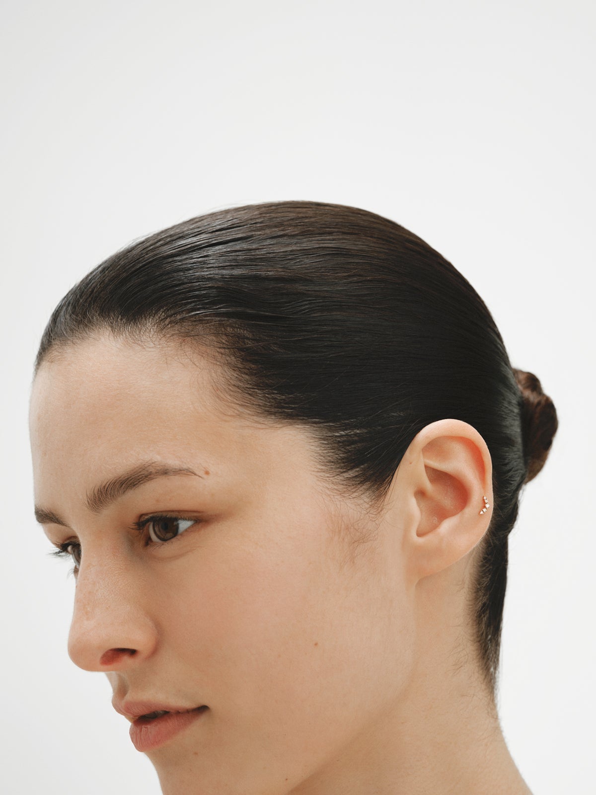 Piercing trepador de oro amarillo de 18K con diamantes