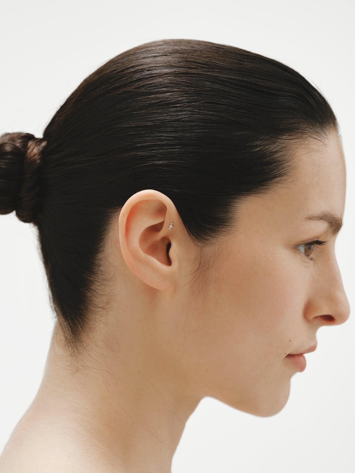 Piercing de oro blanco de 18K  con diamantes