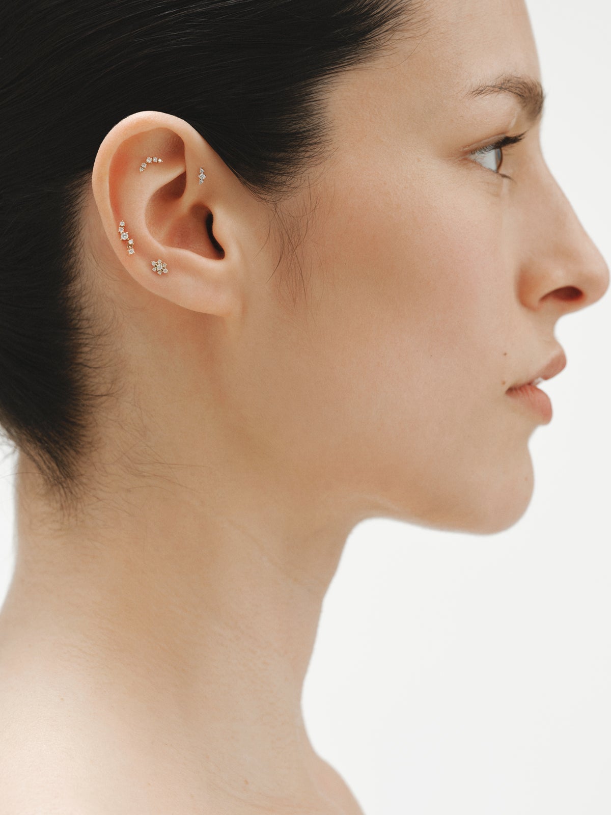 Piercing de oro blanco de 18K  con diamantes