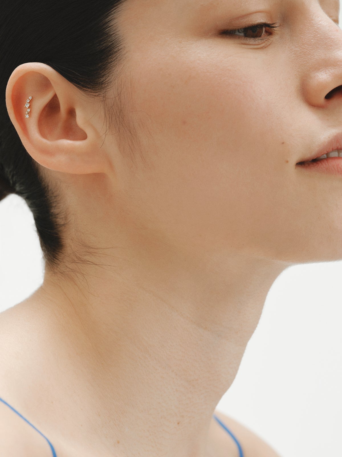 Piercing trepador de oro amarillo de 18K con diamantes