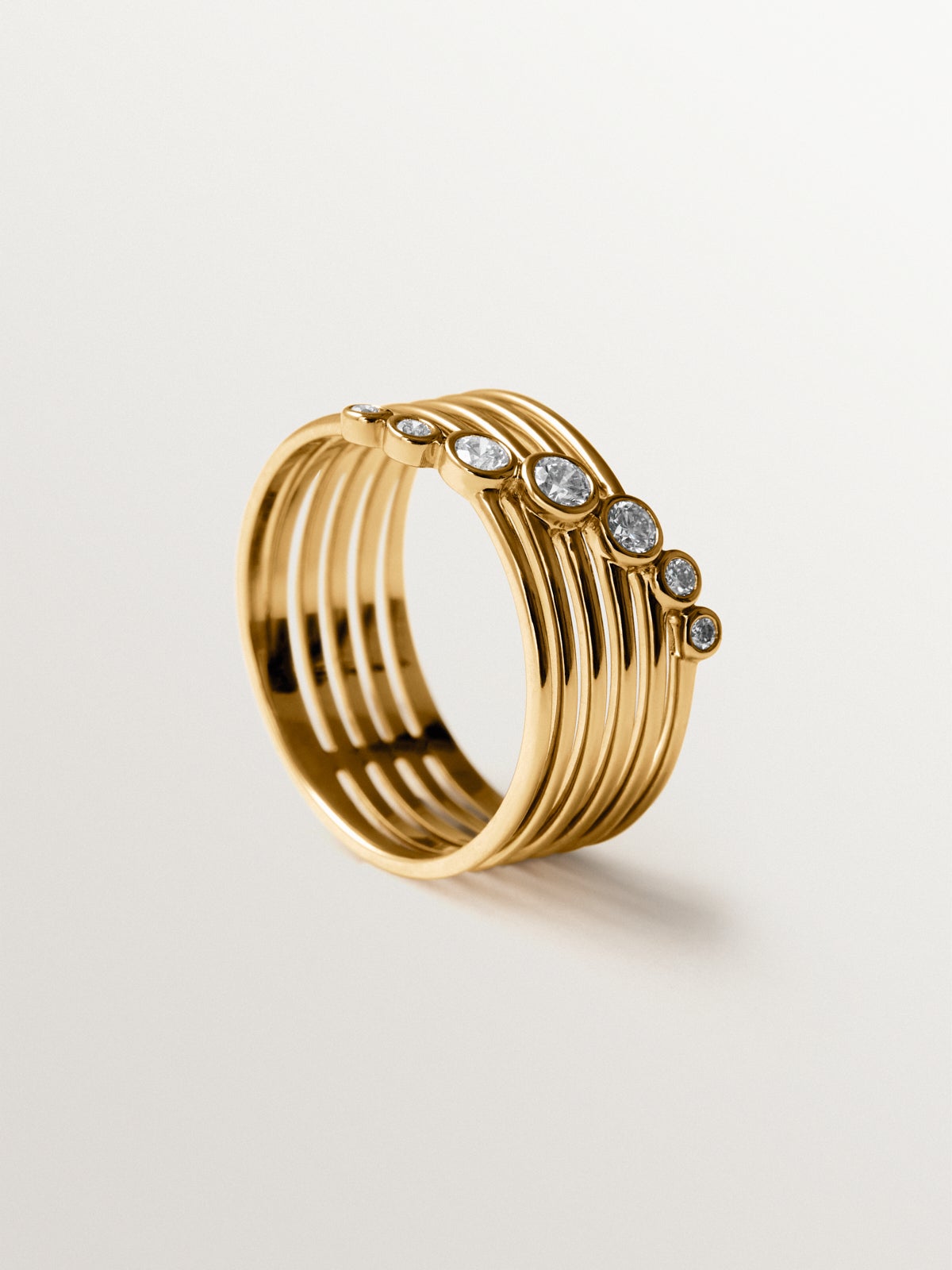 Anillo multibrazo de oro blanco y amarillo de 9K con diamantes en talla brillante