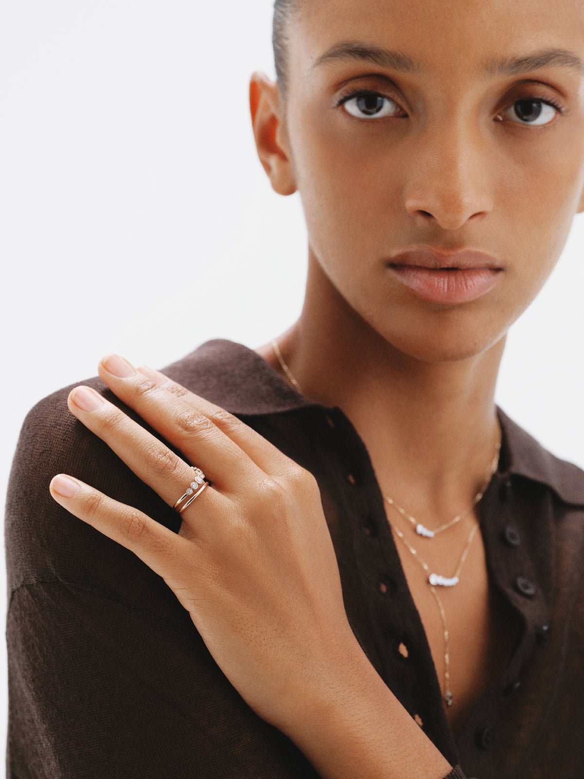 Anillo doble de oro amarillo de 9K con diamantes