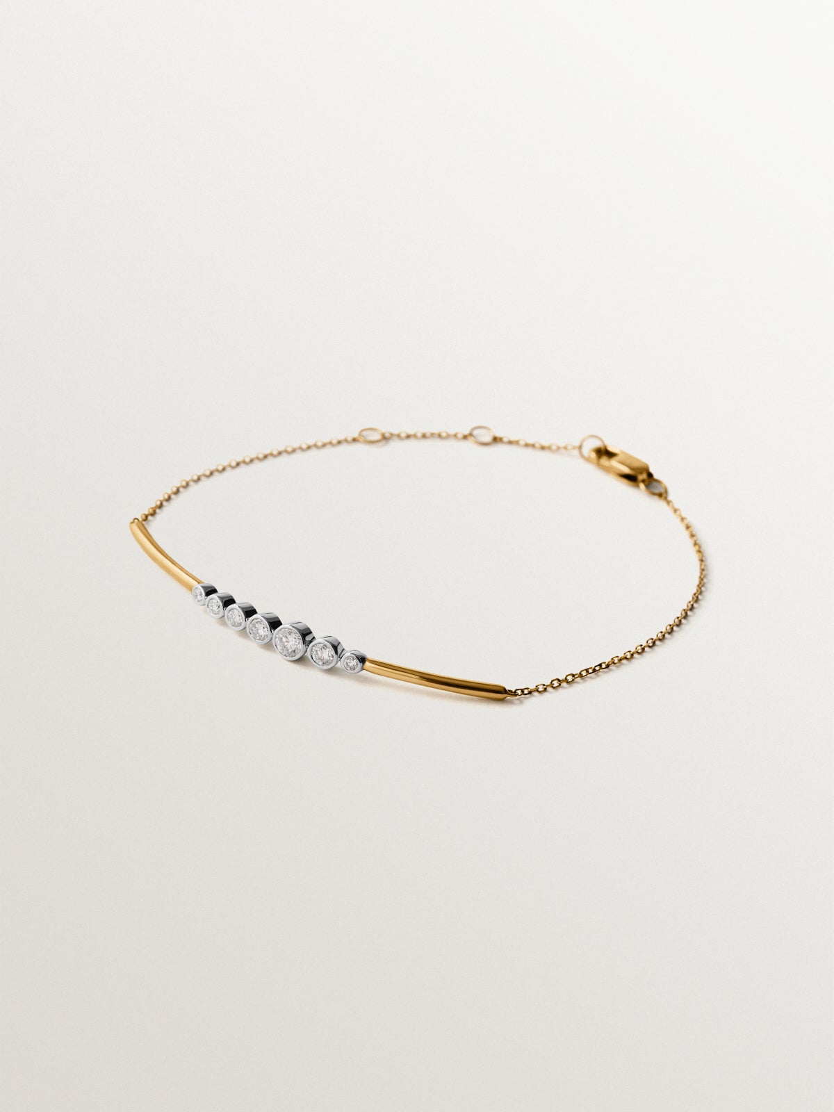 Pulsera de oro blanco y amarillo de 9K con diamantes
