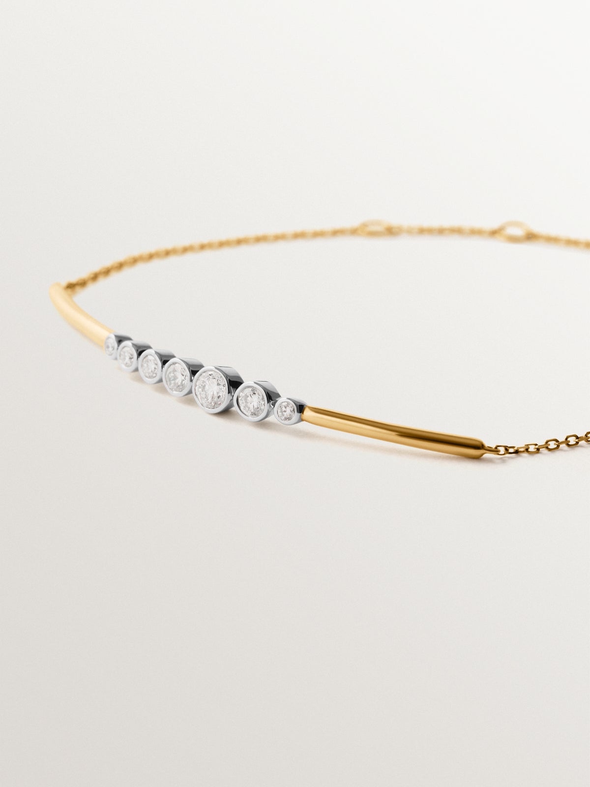 Pulsera de oro blanco y amarillo de 9K con diamantes