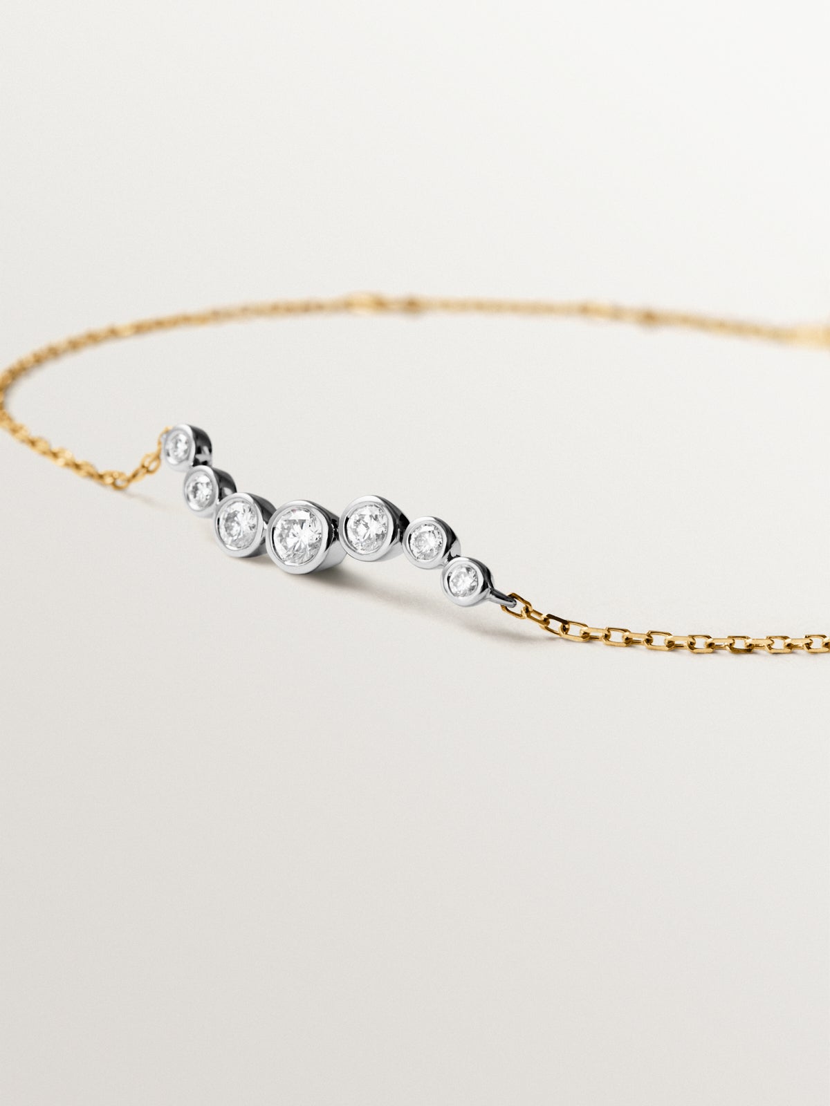 Pulsera de oro blanco y amarillo de 9K con diamantes