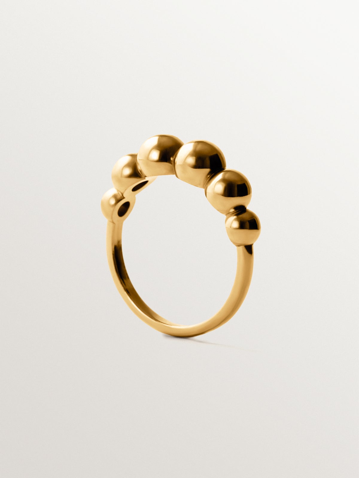 Anillo de plata 925 bañada en oro amarillo de 18K con motivo de esferas