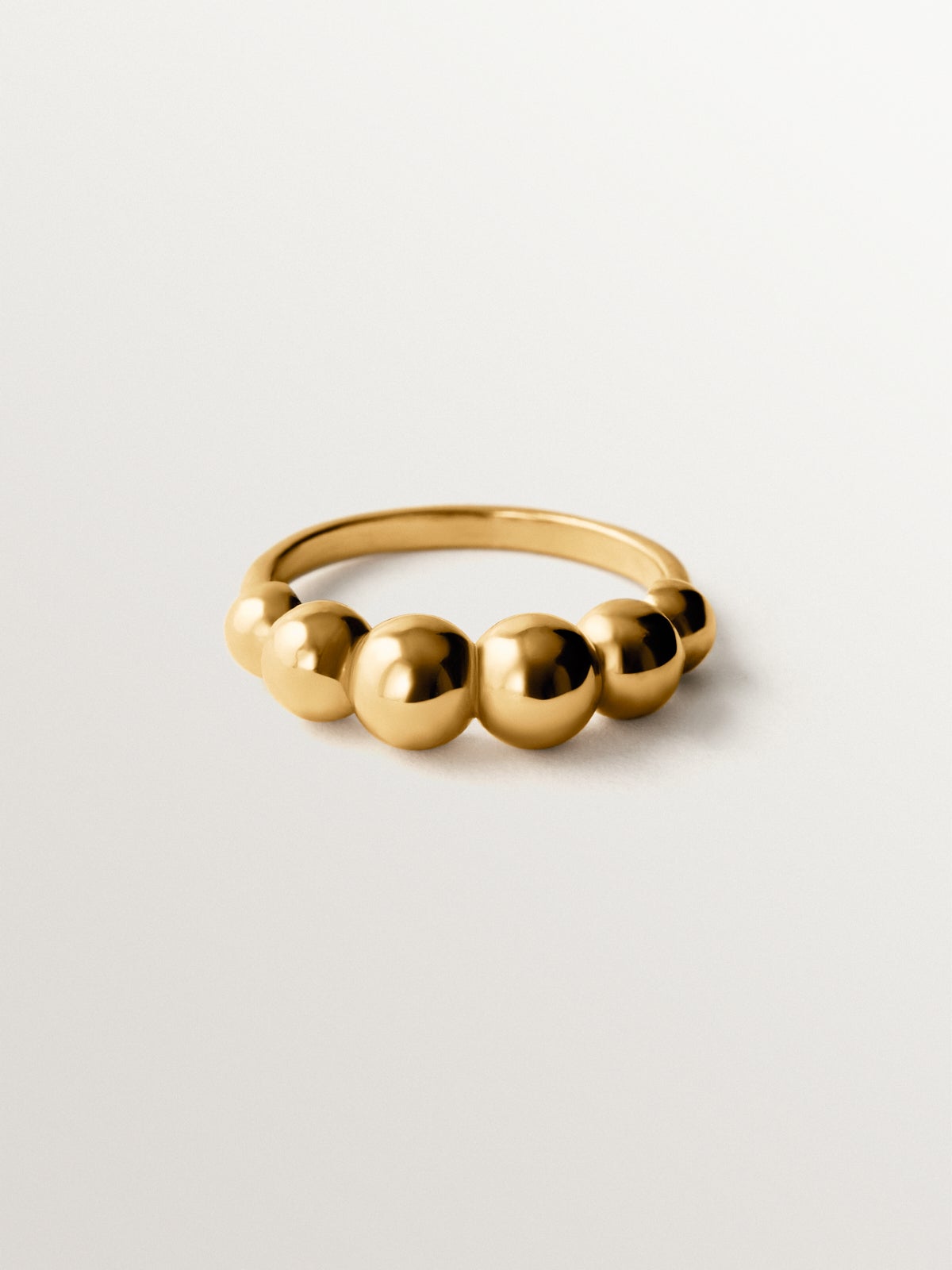 Anillo de plata 925 bañada en oro amarillo de 18K con motivo de esferas