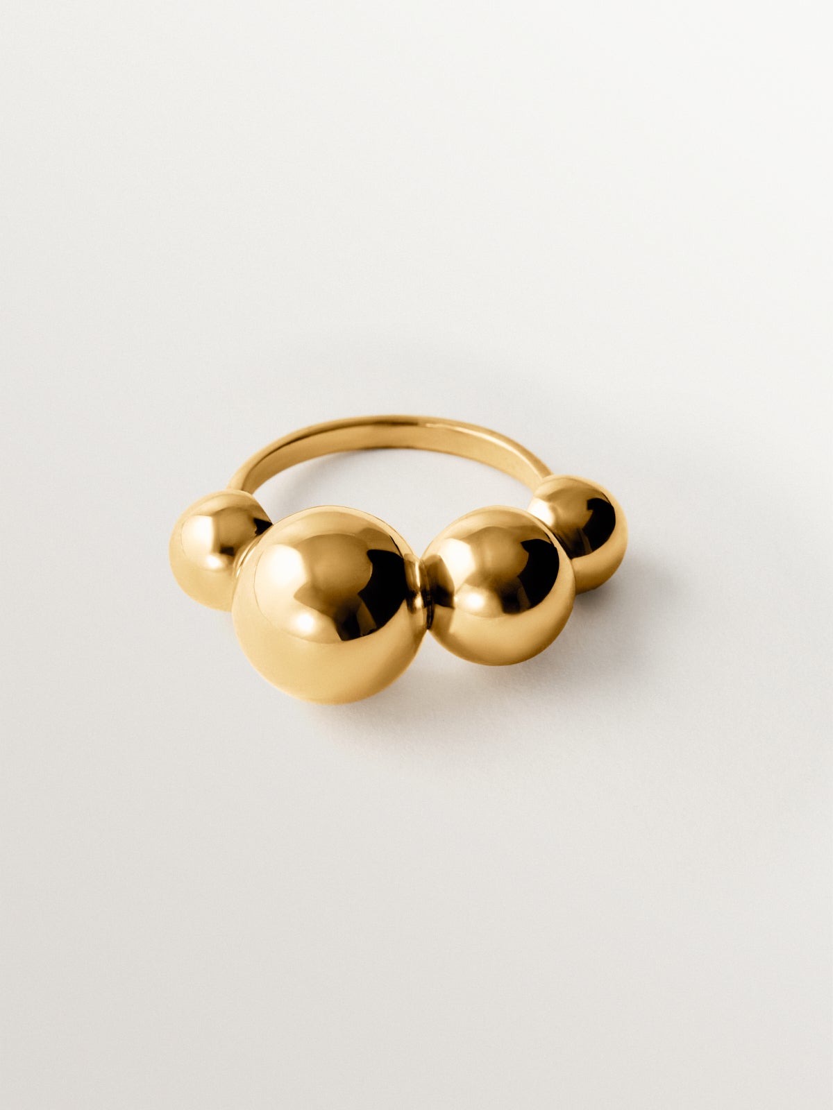 Anillo de plata 925 bañada en oro amarillo de 18K con esferas