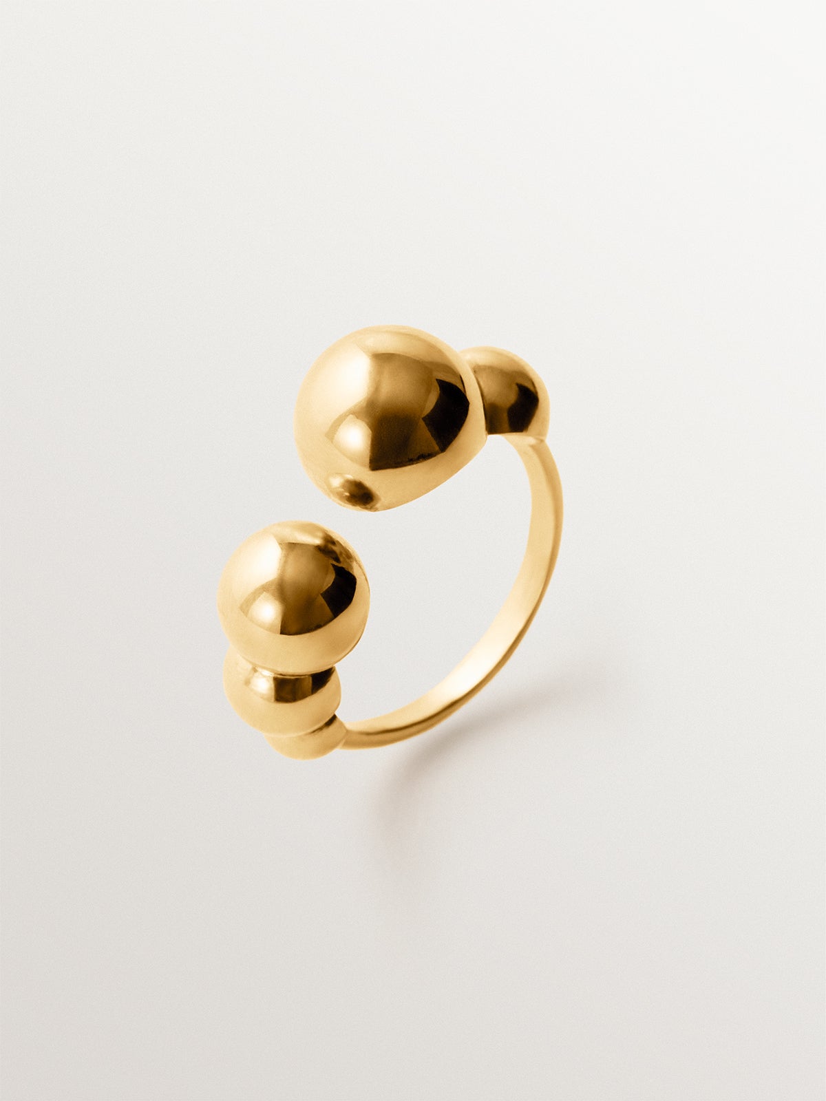 Anillo abierto de plata 925 bañada en oro amarillo de 18K con esferas