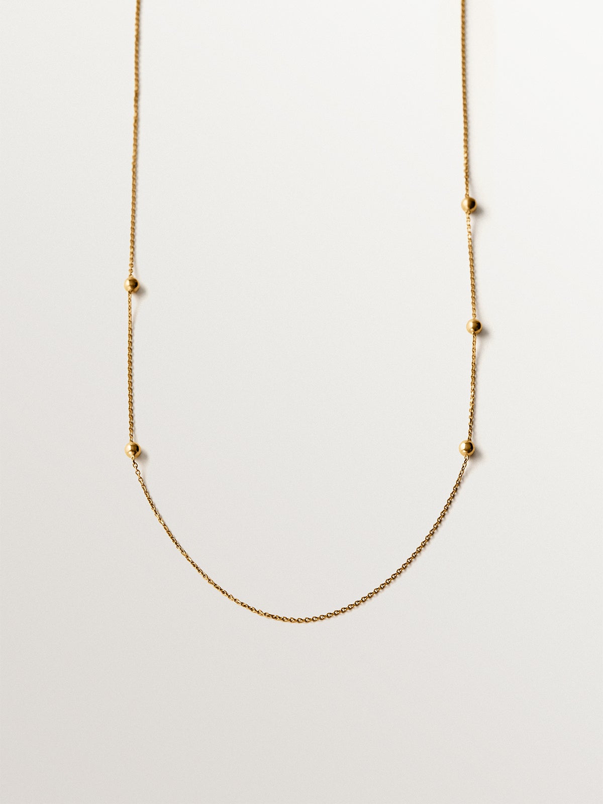 Colgante de plata 925 bañada en oro amarillo de 18K con esferas