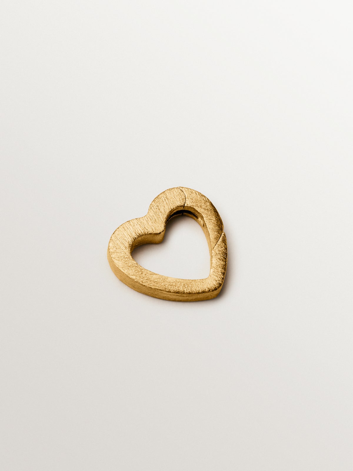 Charm corazón de plata bañada en oro amarillo de 18K