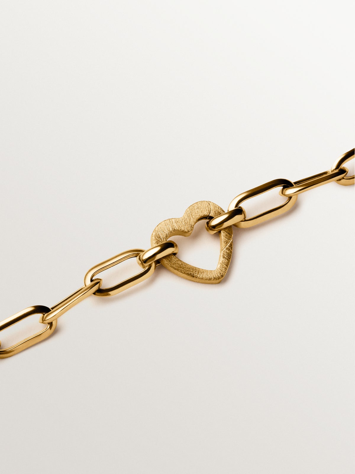 Charm corazón de plata bañada en oro amarillo de 18K