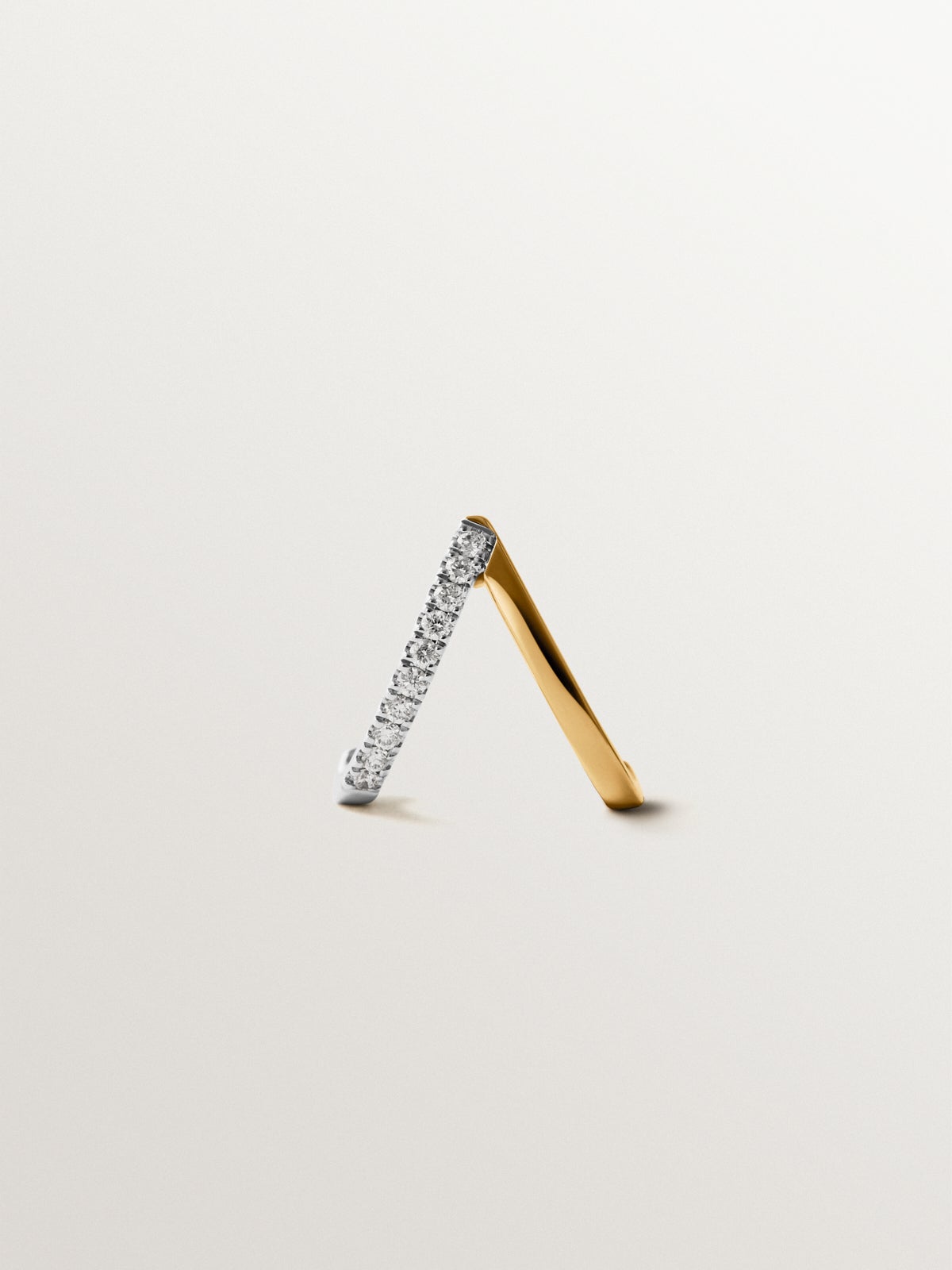 Pendiente individual de oro blanco y amarillo de 18K con esmeralda y diamantes