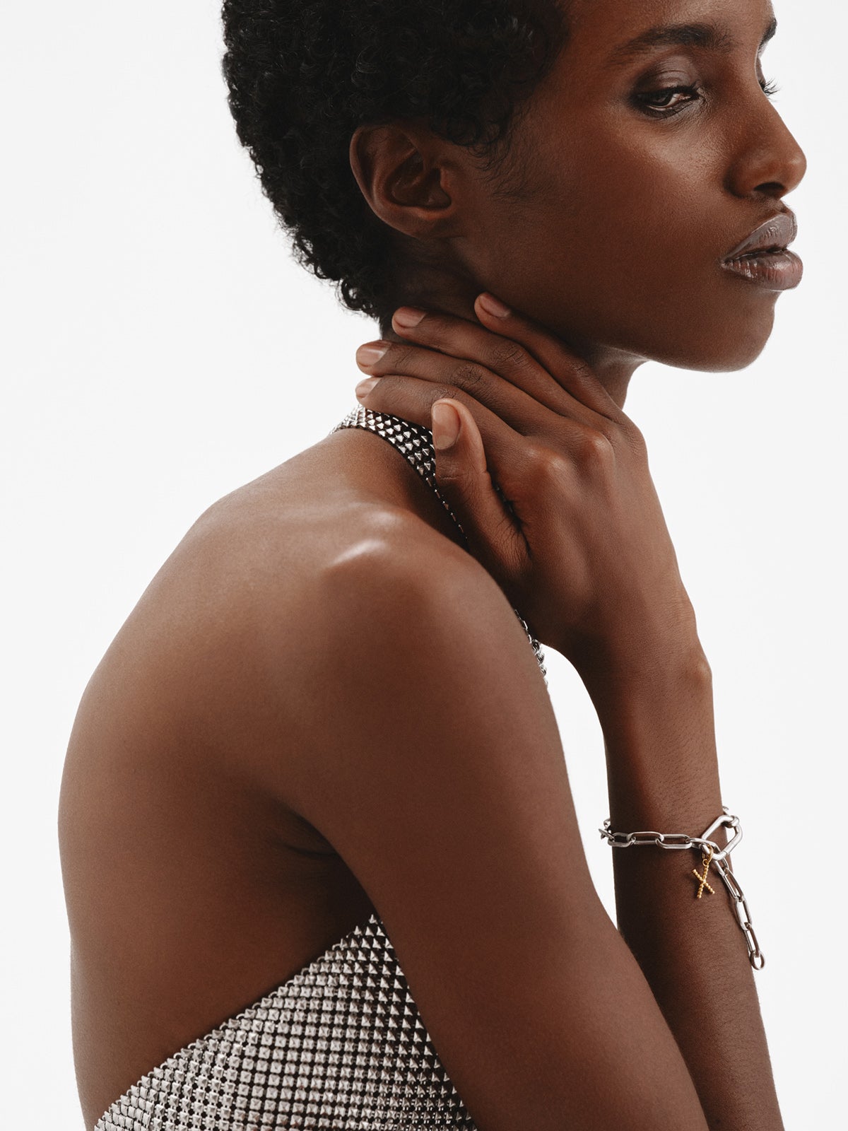 Charm de plata 925 bañada en oro amarillo de 18K con letra X y motivos de esferas