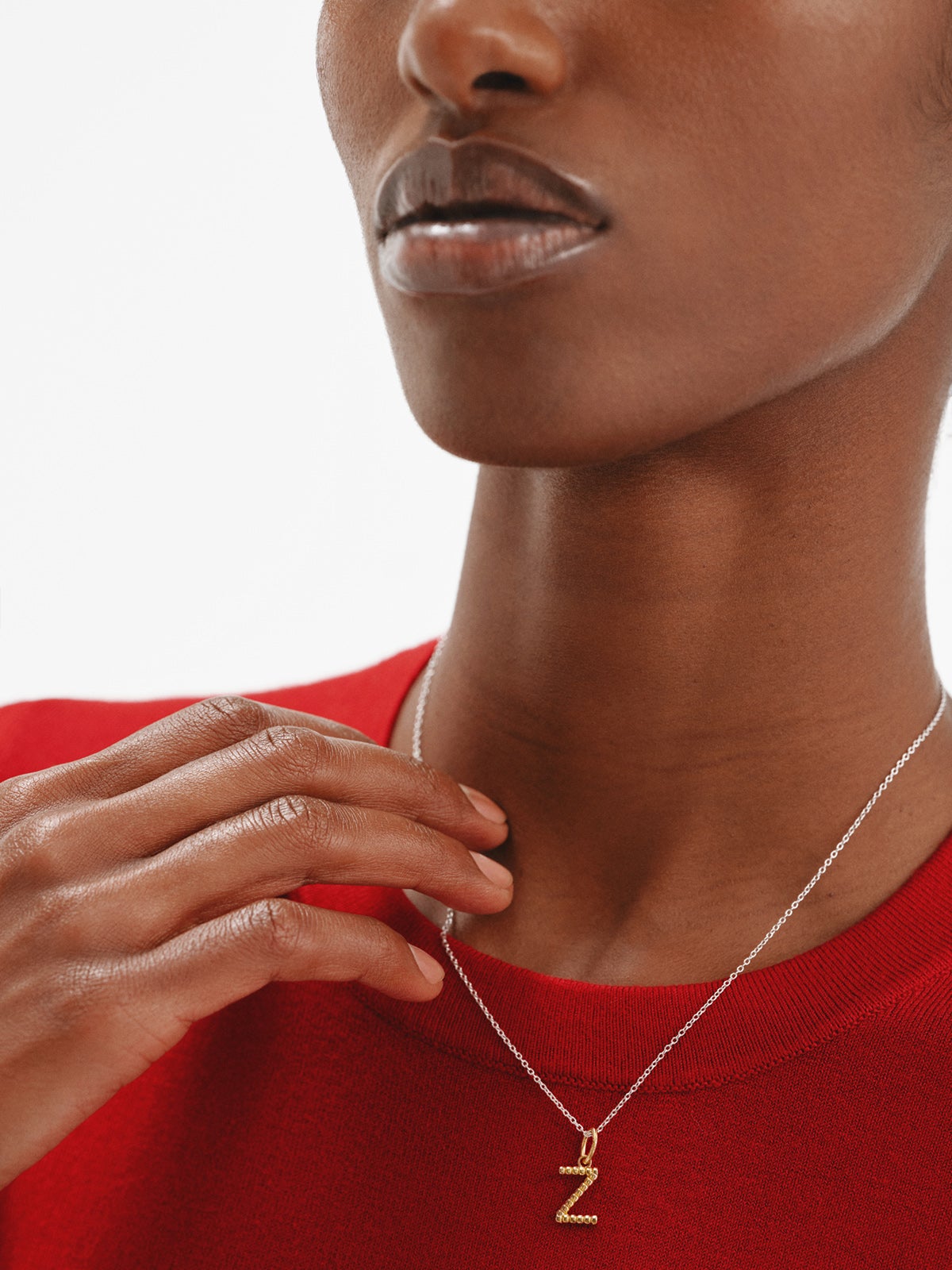 Charm de plata 925 bañada en oro amarillo de 18K con letra Z y motivos de esferas