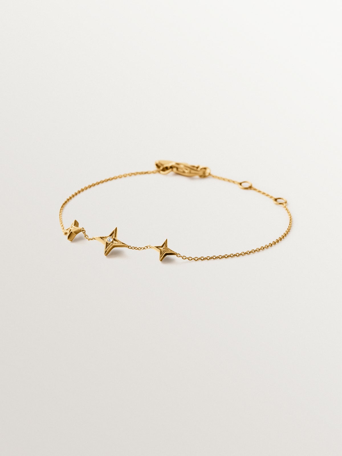 Pulsera de plata 925 bañada en oro amarillo de 18K con topacio blanco y forma de estrellas