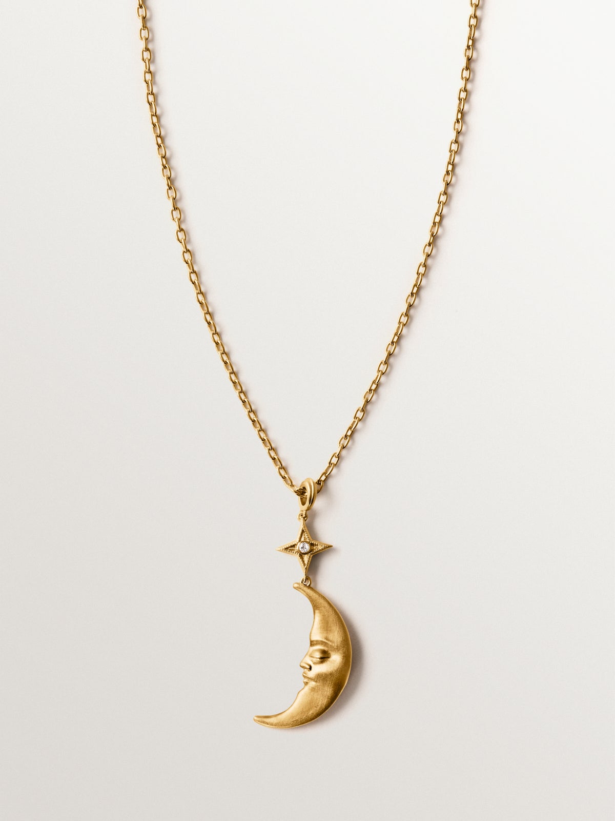 Collar de plata 925 bañada en oro amarillo de 18K con luna y topacio blanco