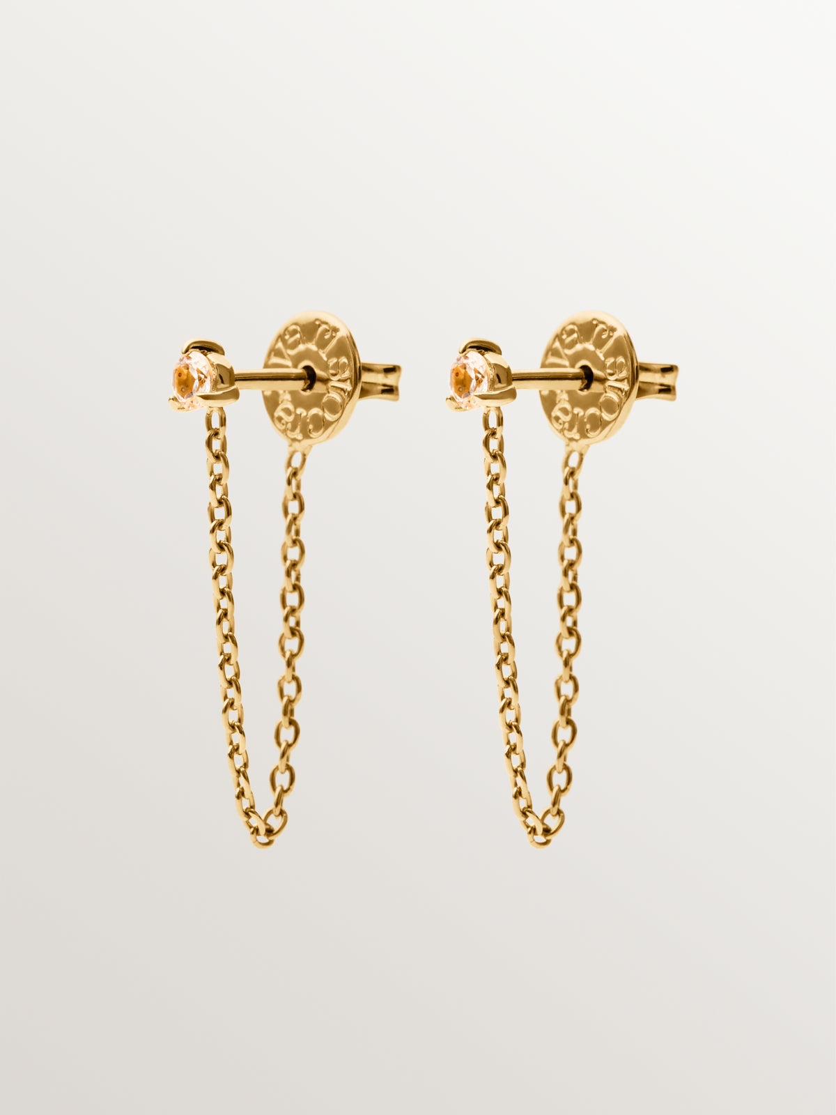 Pendientes de plata bañada en oro amarillo de 18K con topacios blancos y cadena