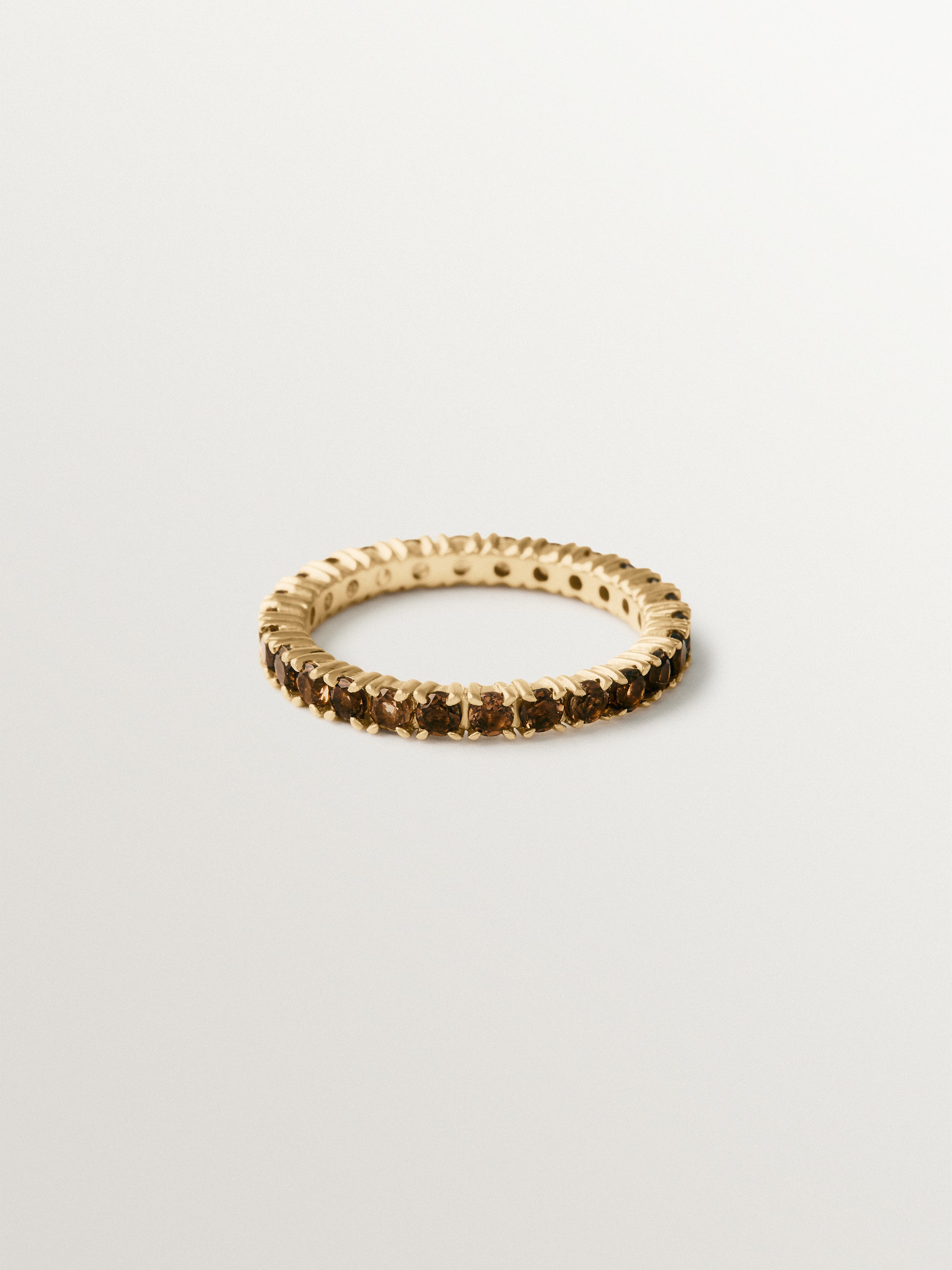 Anillo rivière de plata 925 bañada en oro de 18K con topacios marrones