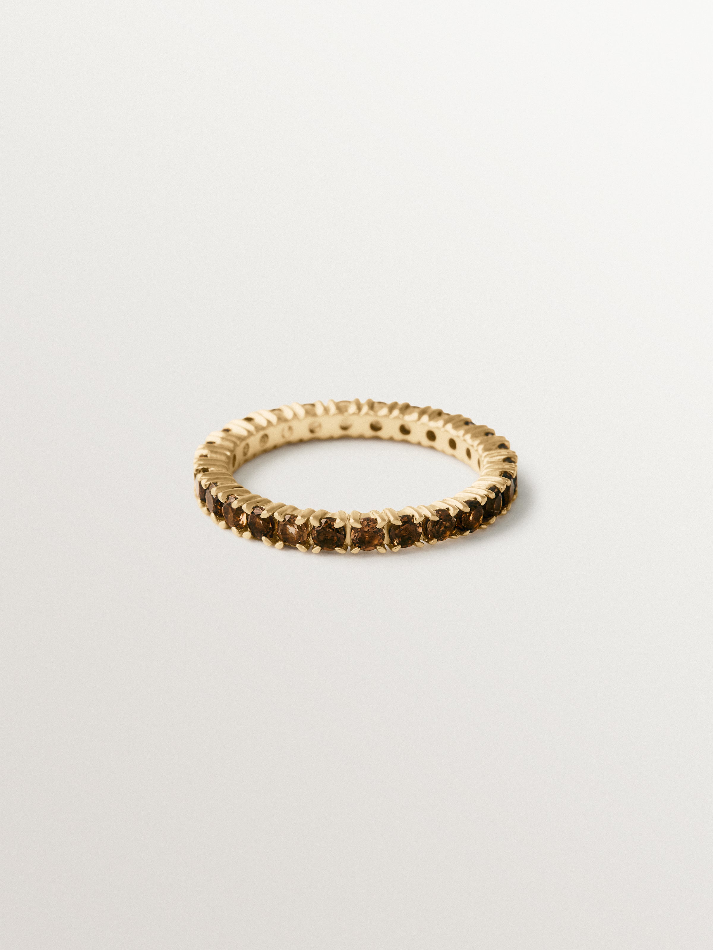 Anillo rivière de plata 925 bañada en oro de 18K con topacios marrones
