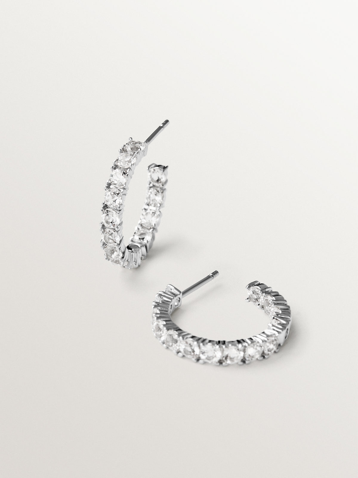 Boucles d'oreilles créoles en argent 925 avec topazes blanches