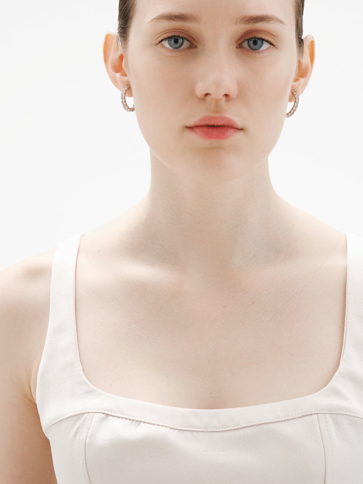 Pendientes de aro de plata 925 con topacios blancos