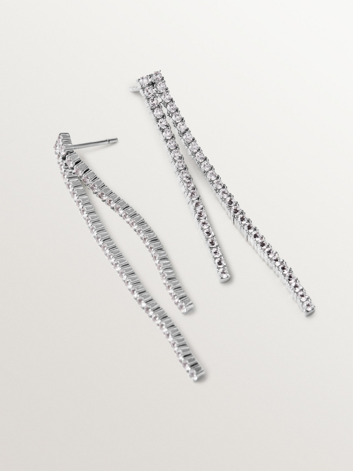 Long 925 silver earrings with white topazes