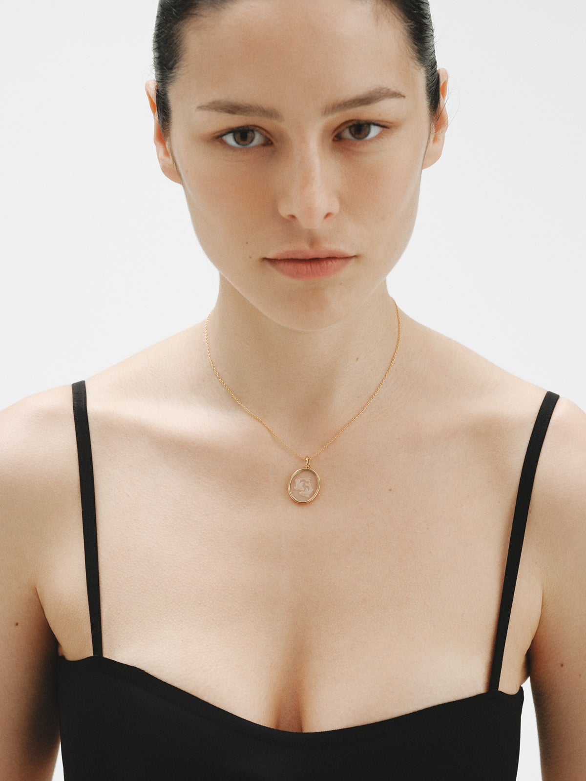 Charm Piscis de plata 925 bañada en oro amarillo de 18K y cristal de roca