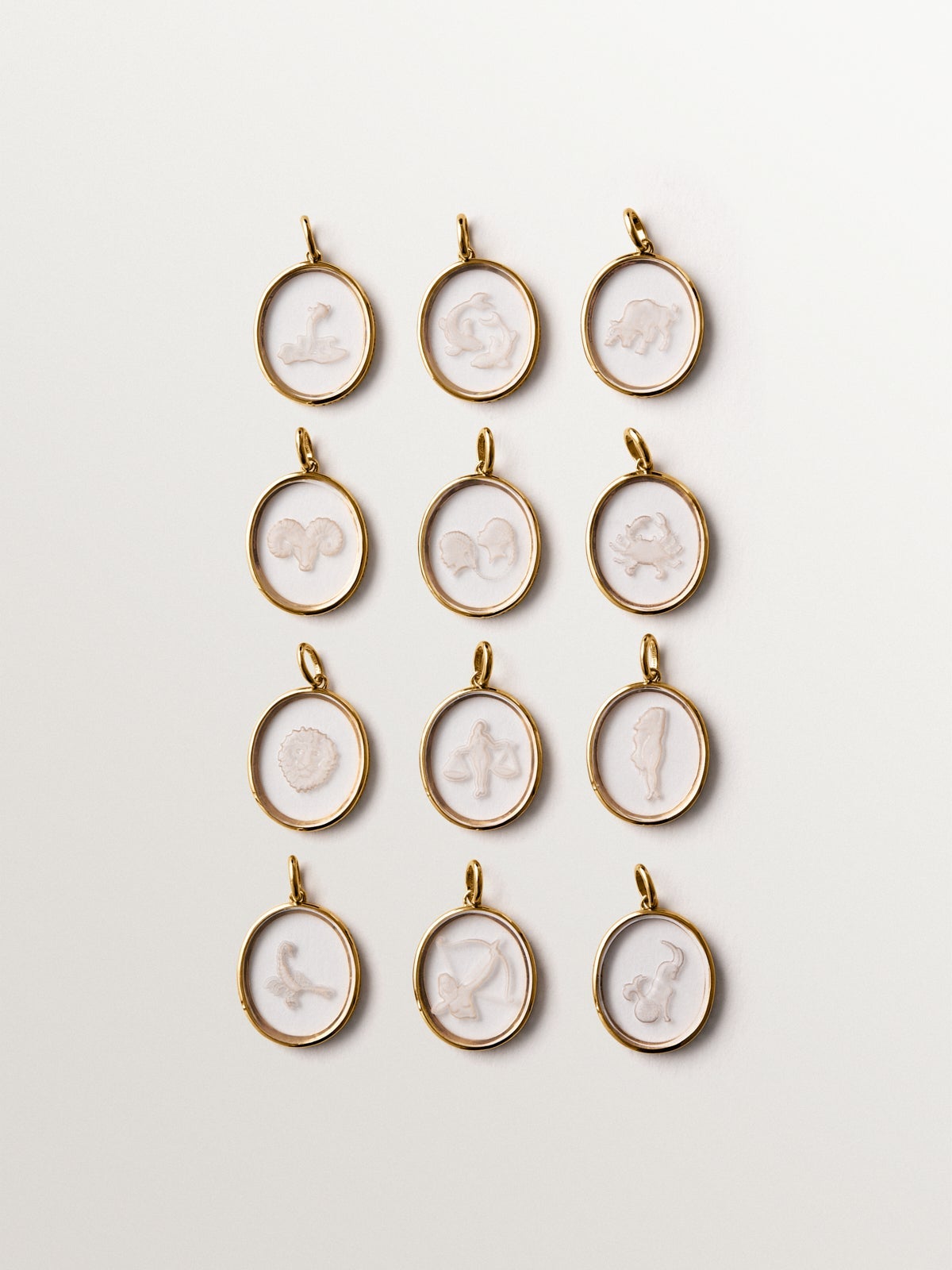 Charm Piscis de plata 925 bañada en oro amarillo de 18K y cristal de roca