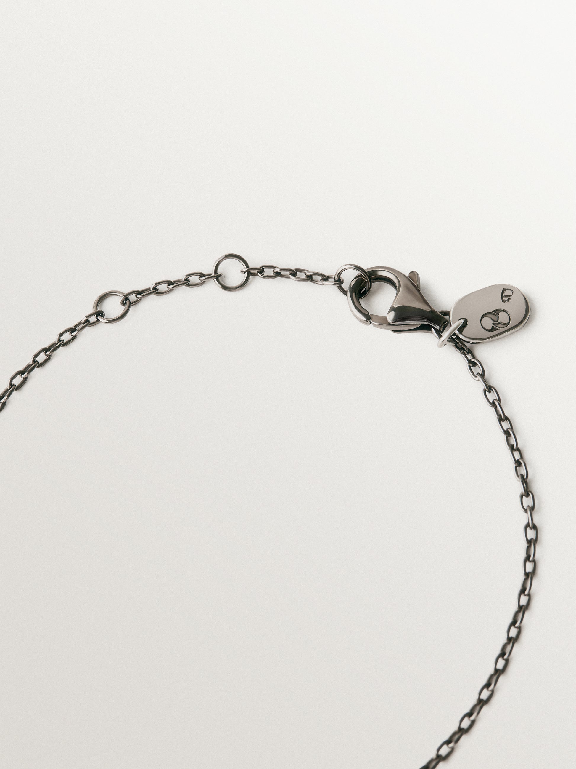 Pulsera de plata 925 con acabado gunmetal y topacios blancos