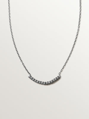 Collar de plata 925 con acabado gunmetal y topacios blancos