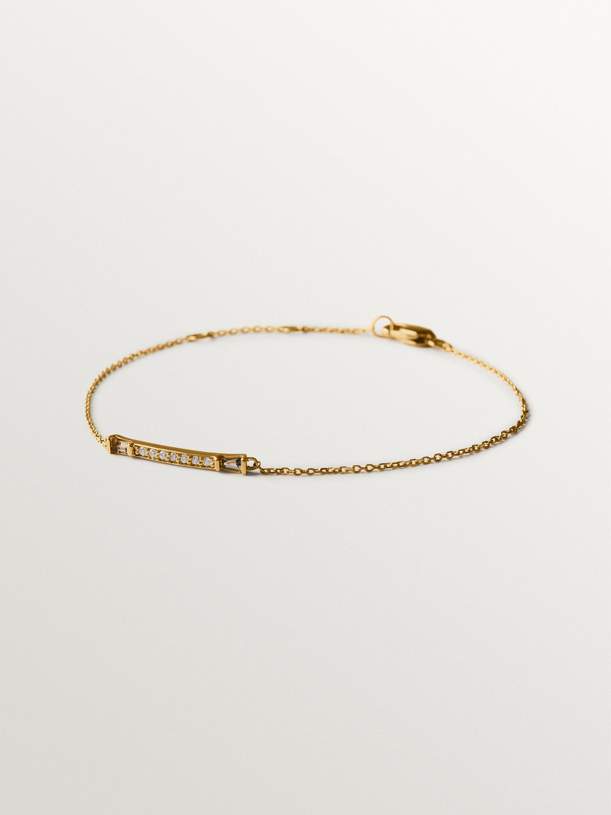 Pulsera de oro amarillo de 9K con diamantes y cuarzos marrones