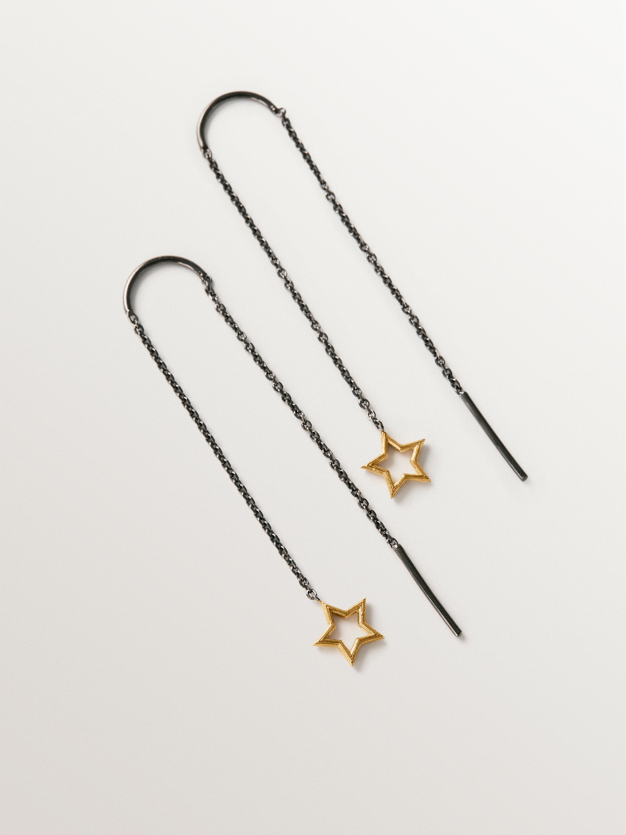 Pendientes largos bicolor de plata 925 bañados en oro amarillo de 18K con forma de estrella