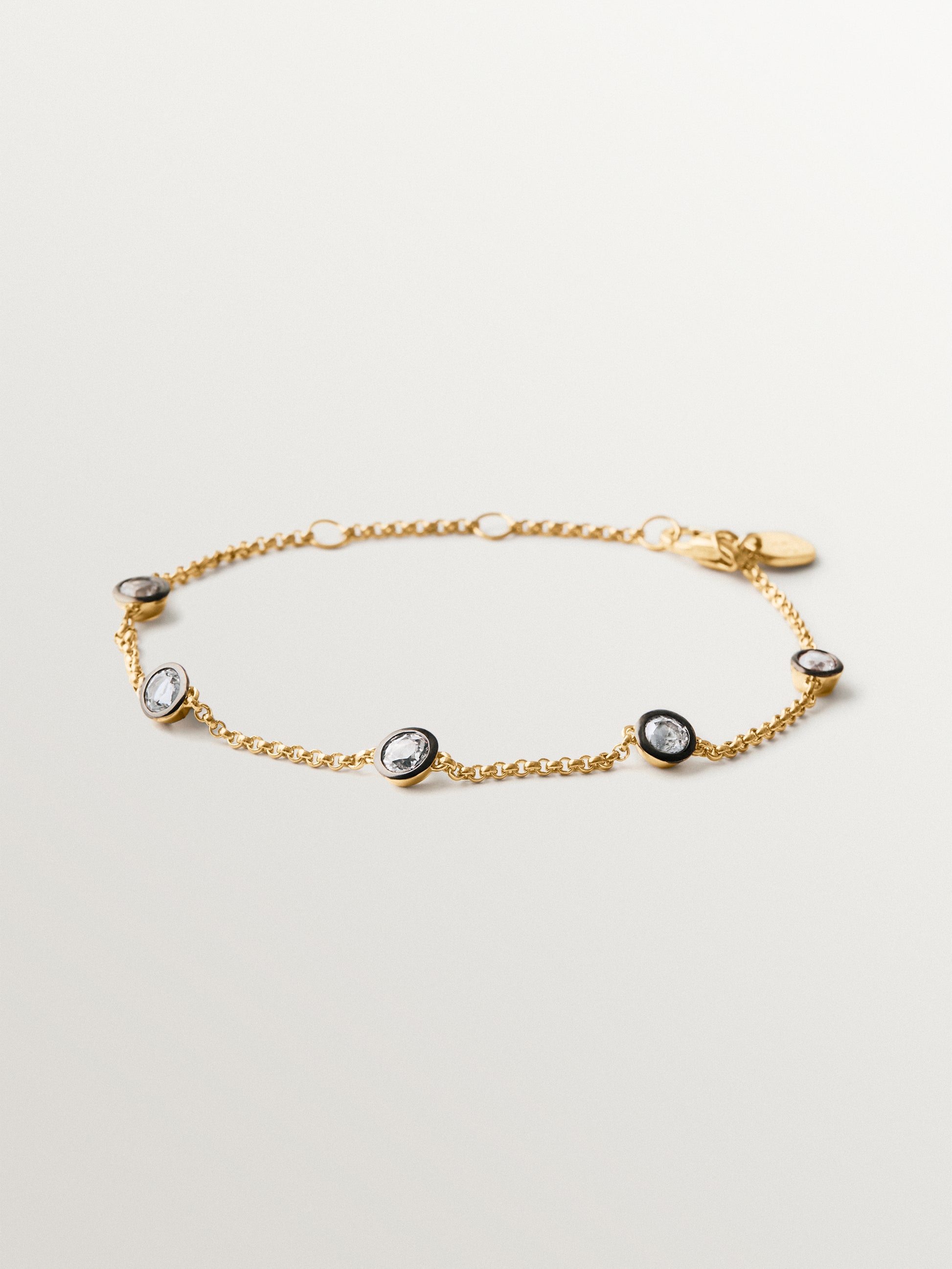 Pulsera bicolor de plata 925 bañada en oro amarillo de 18K con topacios blancos