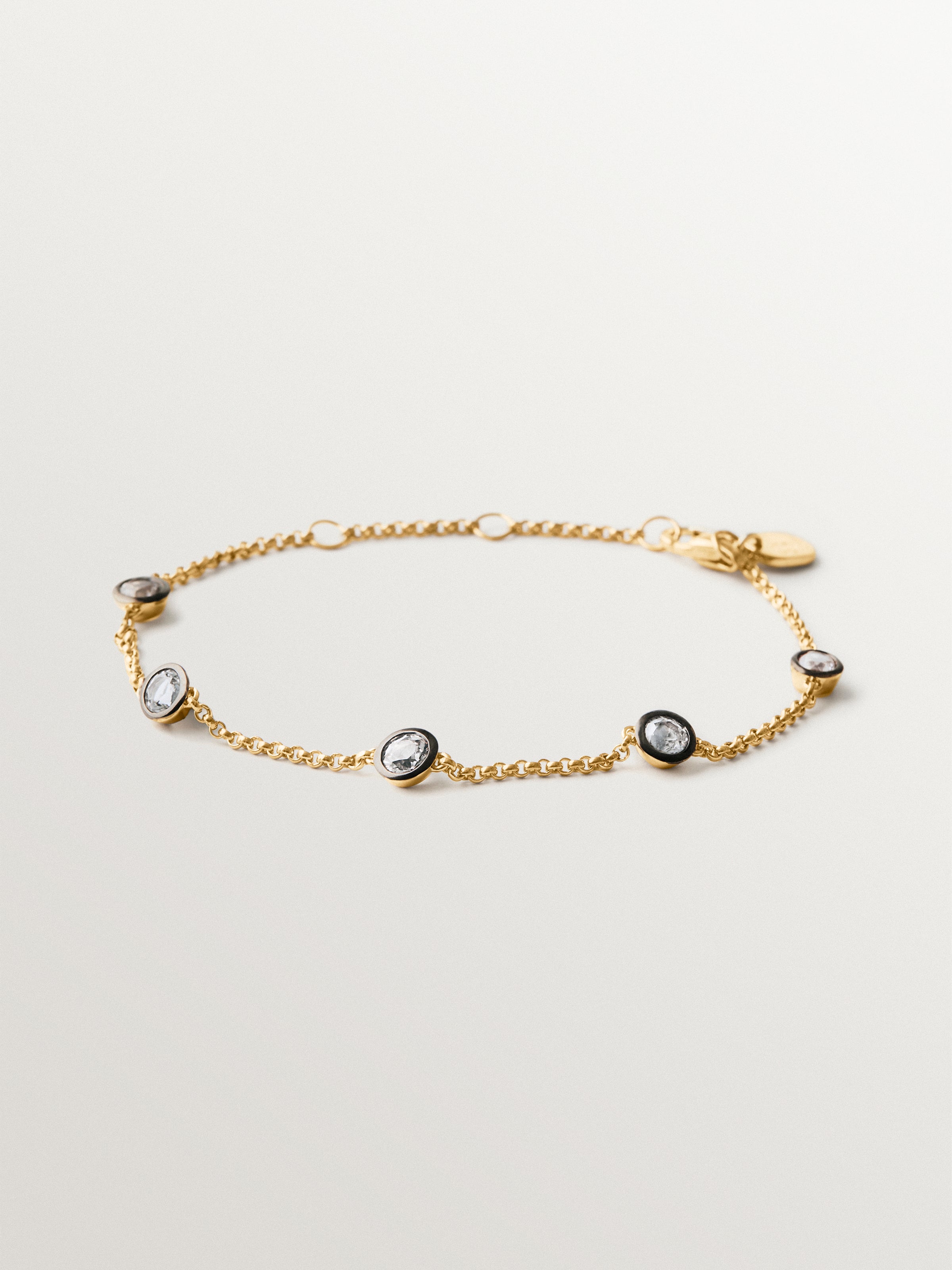 Pulsera bicolor de plata 925 bañada en oro amarillo de 18K con topacios blancos