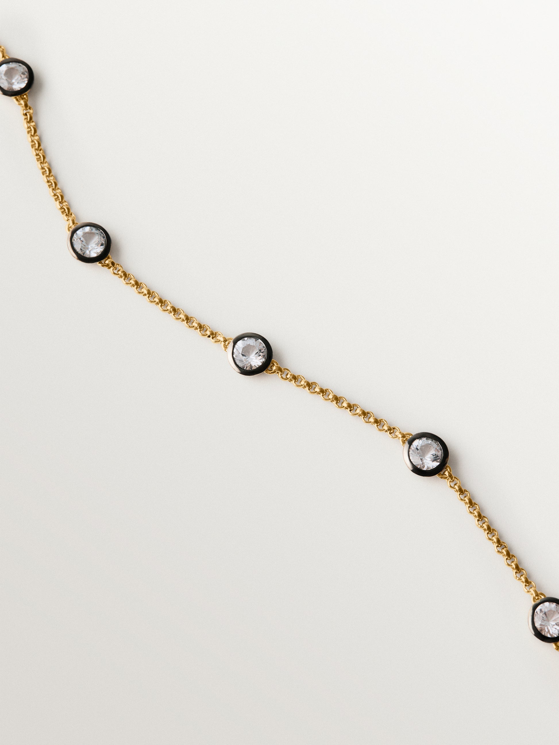Pulsera bicolor de plata 925 bañada en oro amarillo de 18K con topacios blancos