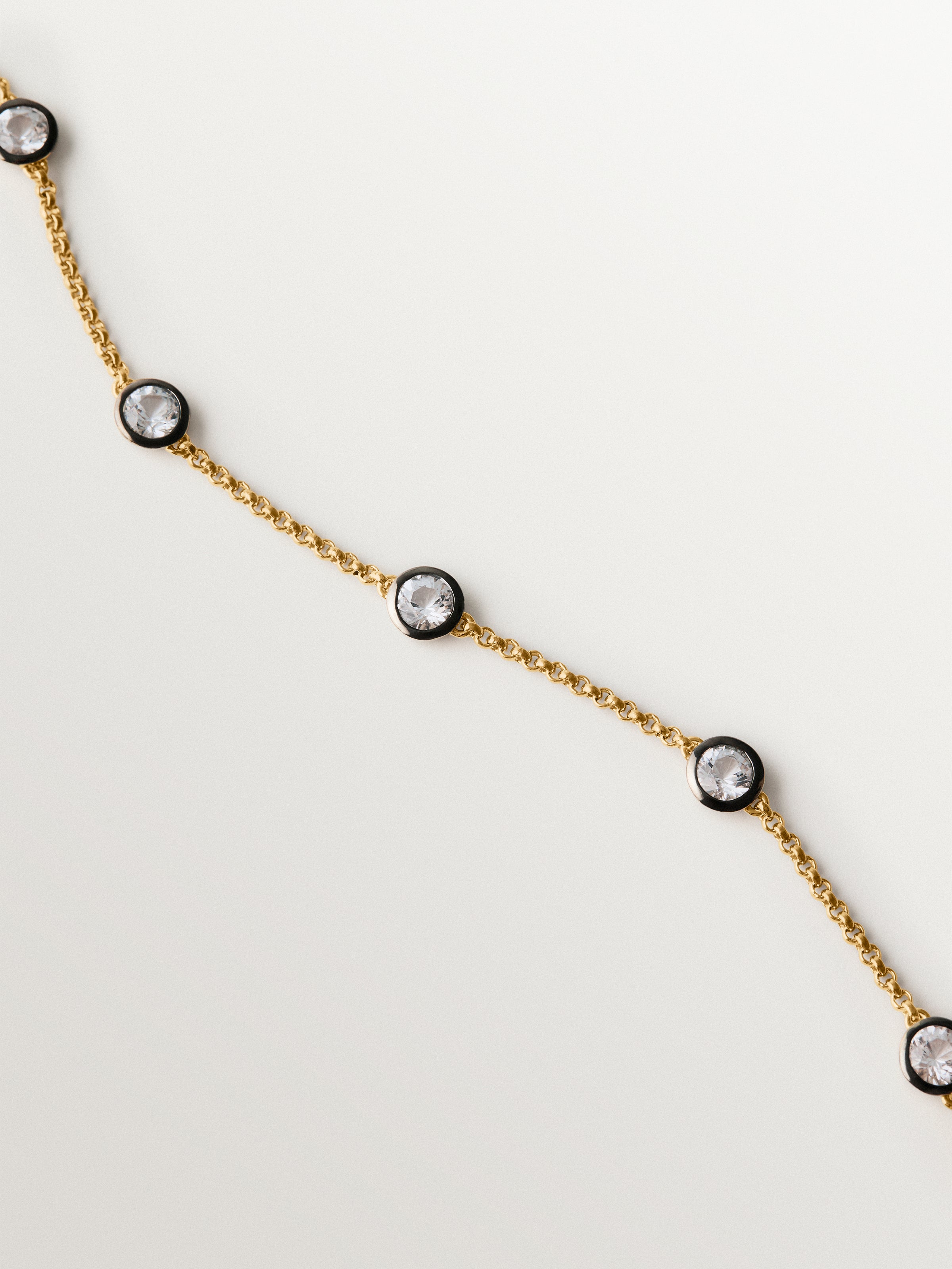 Pulsera bicolor de plata 925 bañada en oro amarillo de 18K con topacios blancos