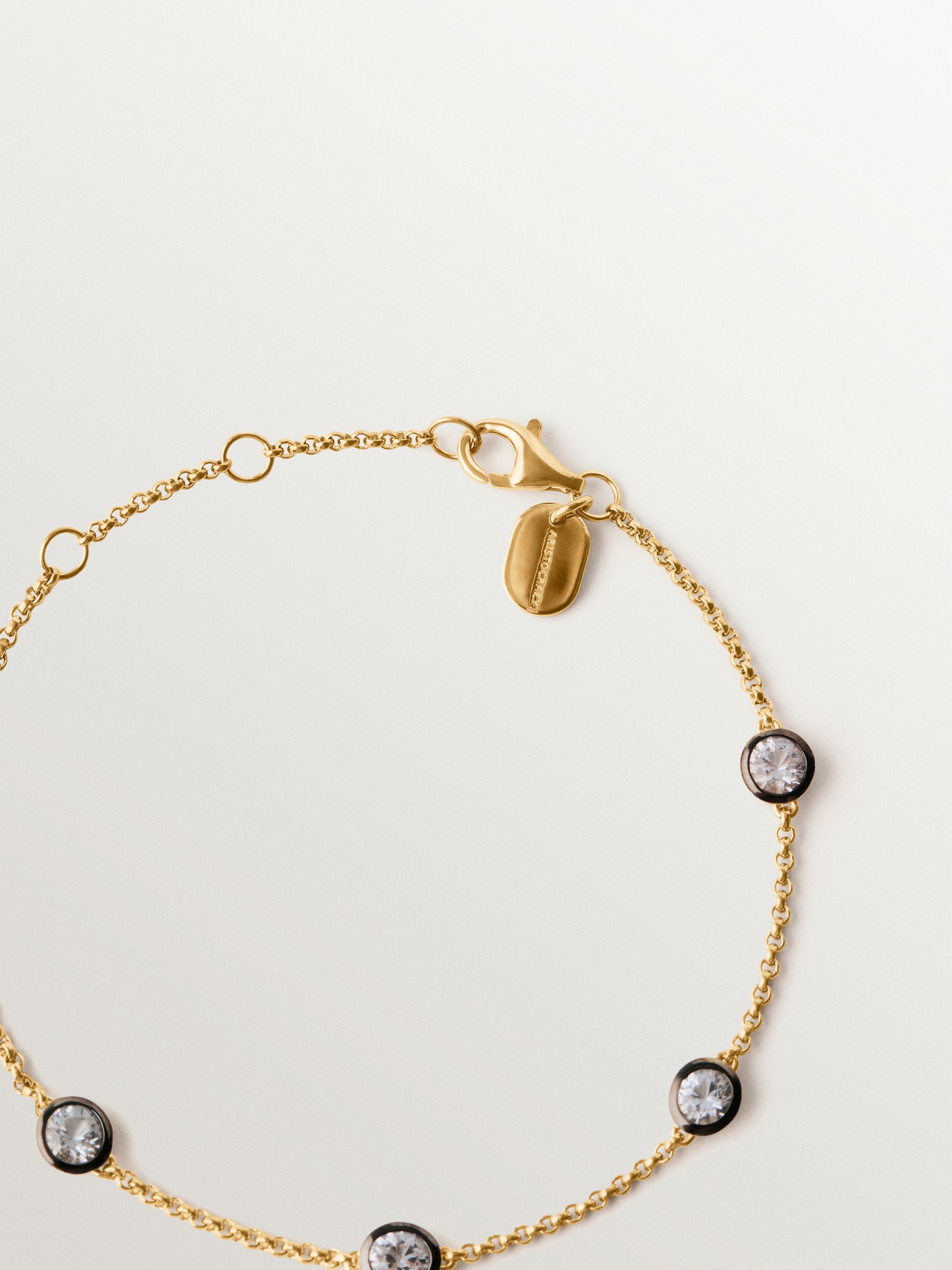 Pulsera bicolor de plata 925 bañada en oro amarillo de 18K con topacios blancos