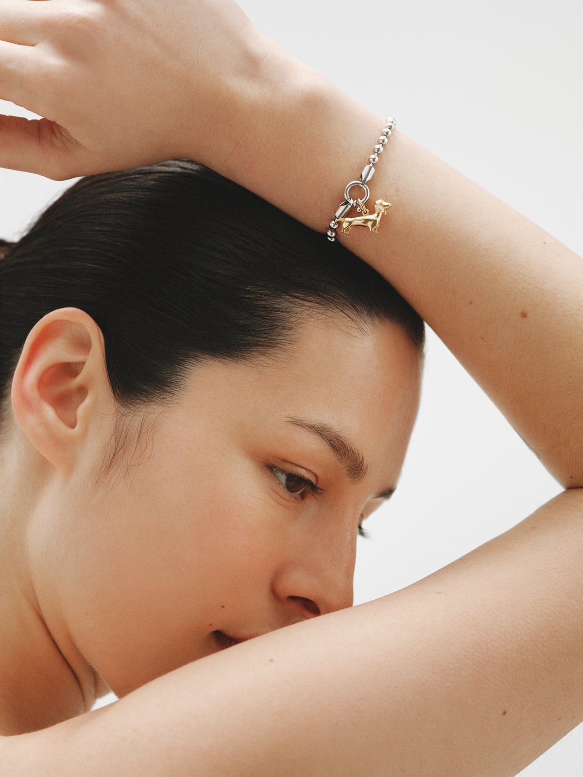 Charm de plata 925 bañada en oro amarillo de 18K con forma de perro