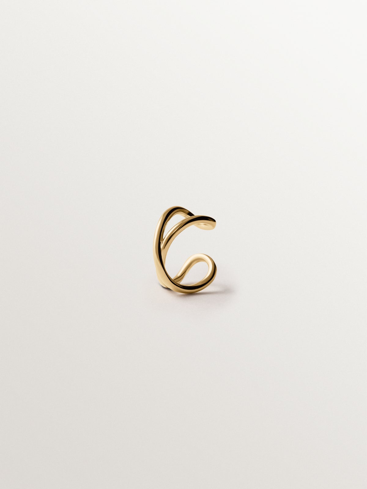 Earcuff cruzado de plata 925 bañada en oro amarillo de 18K