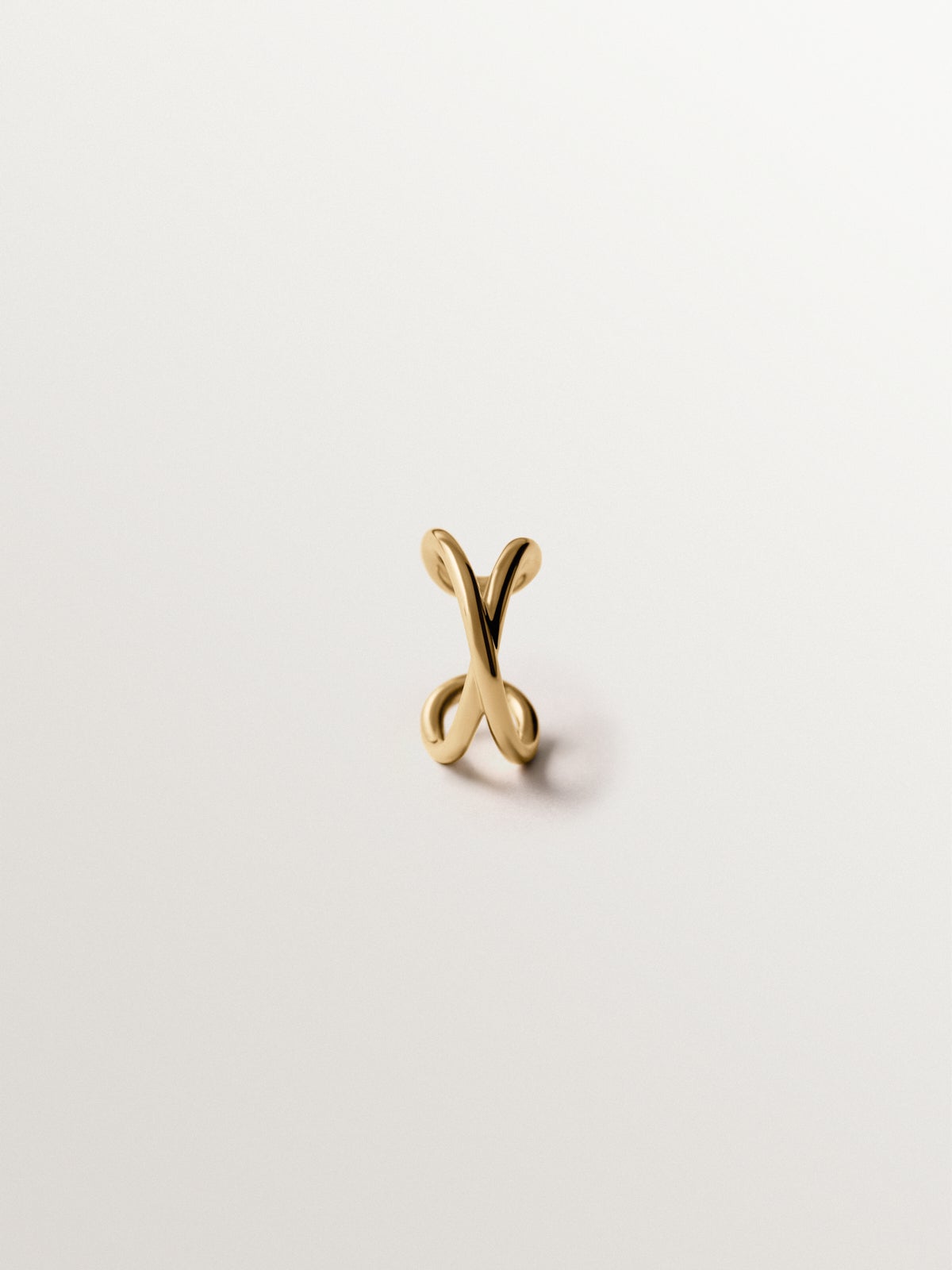 Earcuff cruzado de plata 925 bañada en oro amarillo de 18K