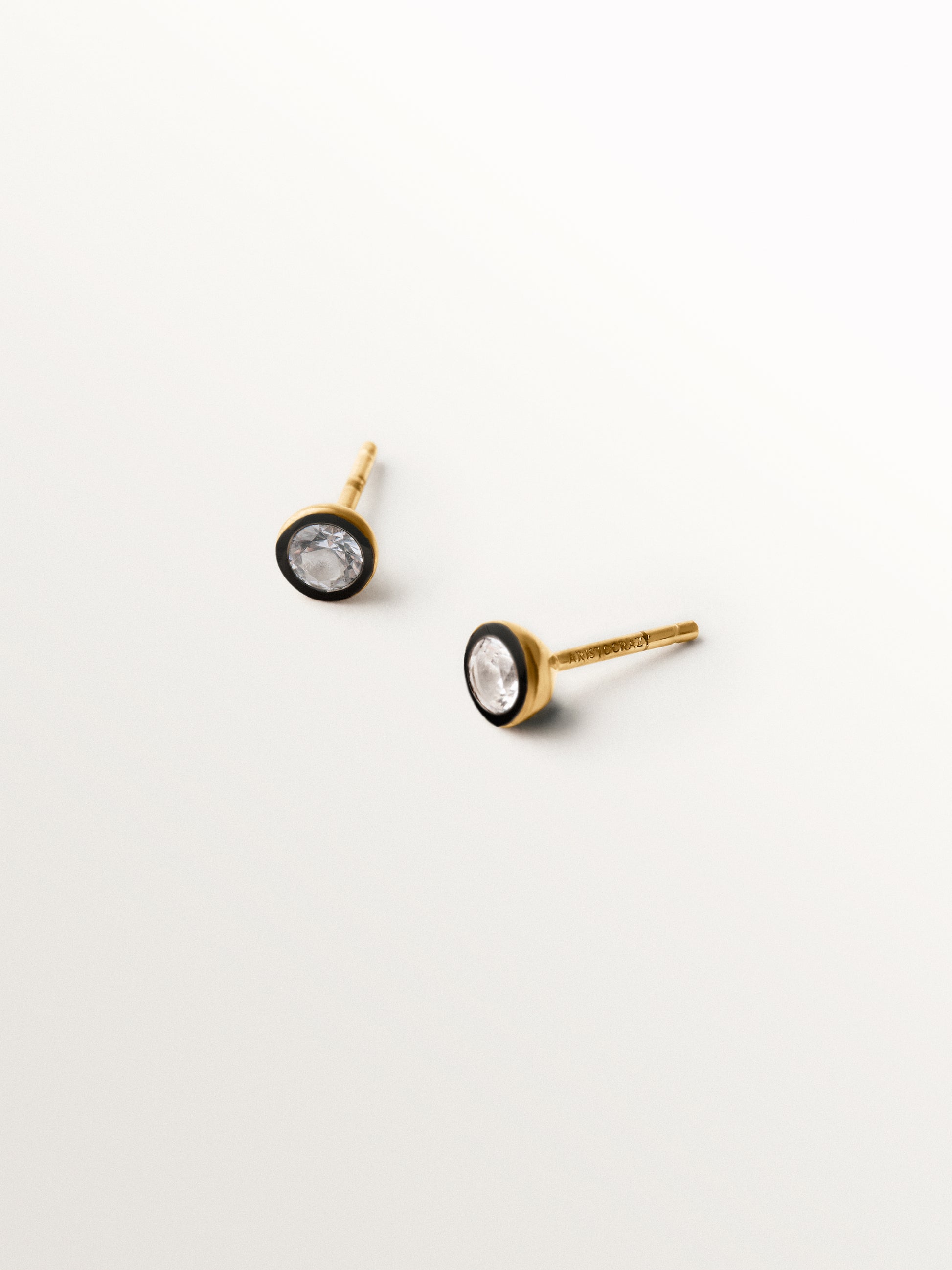 Pendientes bicolor de plata 925 bañada en oro amarillo de 18K con topacios blancos