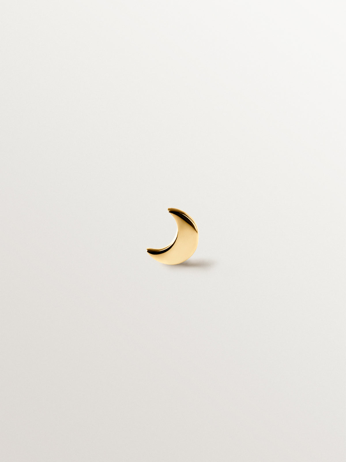 Piercing de oro amarillo de 18K con forma de luna