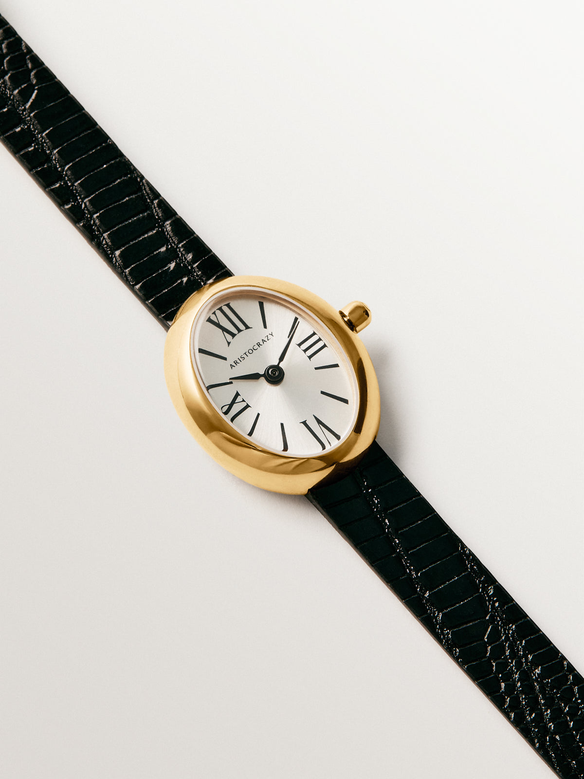 Reloj Salesas de acero con esfera blanca y correa de cuero negra