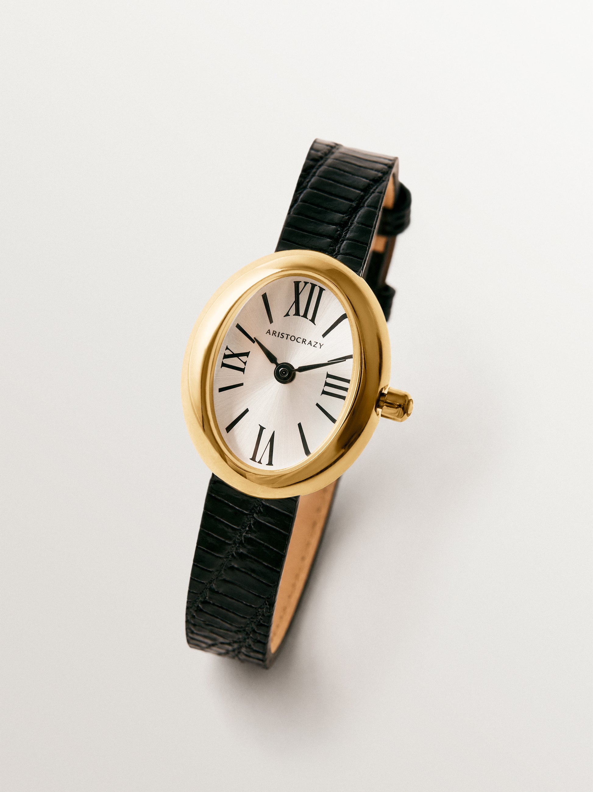 Reloj Salesas de acero con esfera blanca y correa de cuero negra 