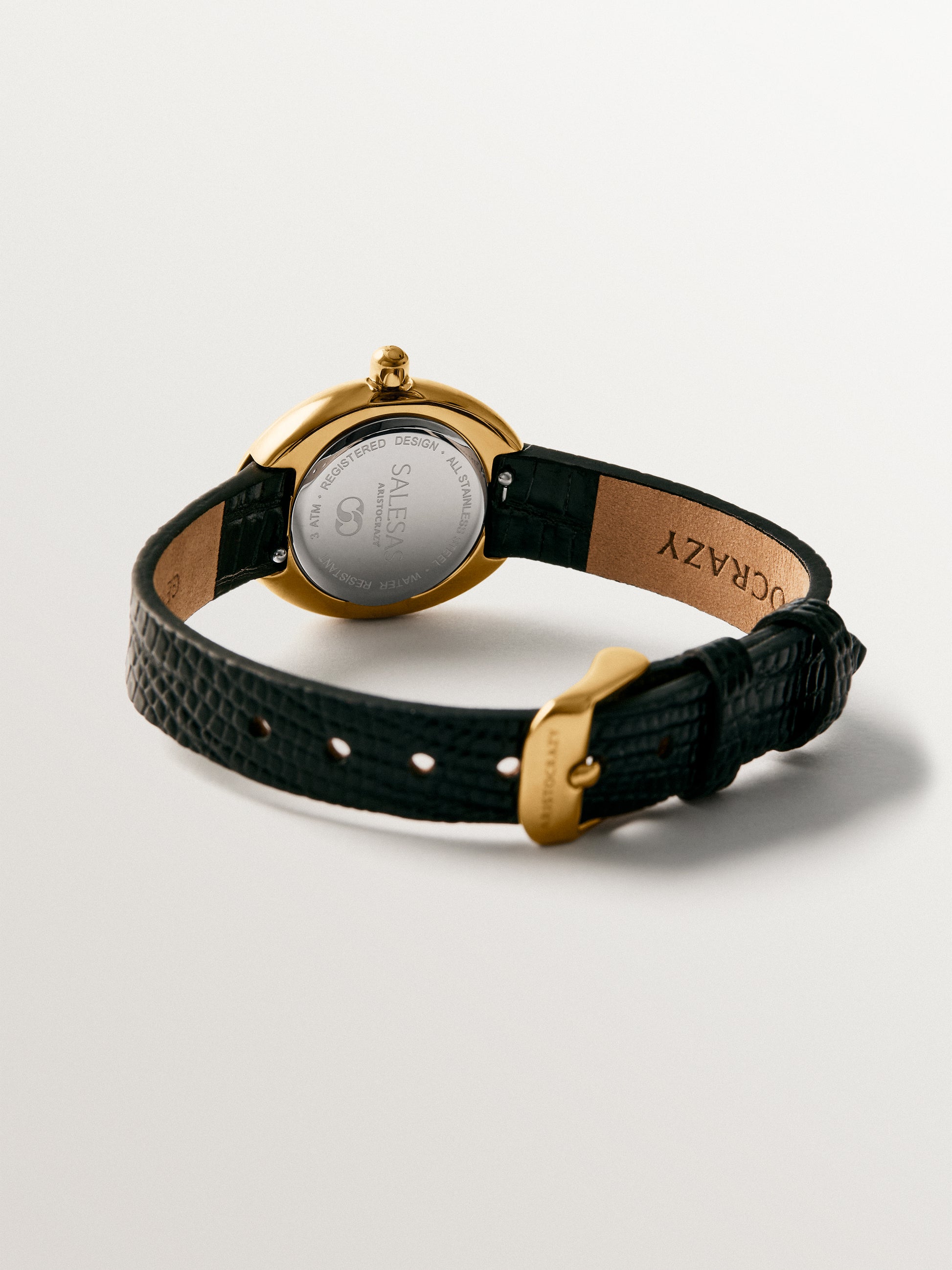 Reloj Salesas de acero con esfera blanca y correa de cuero negra 