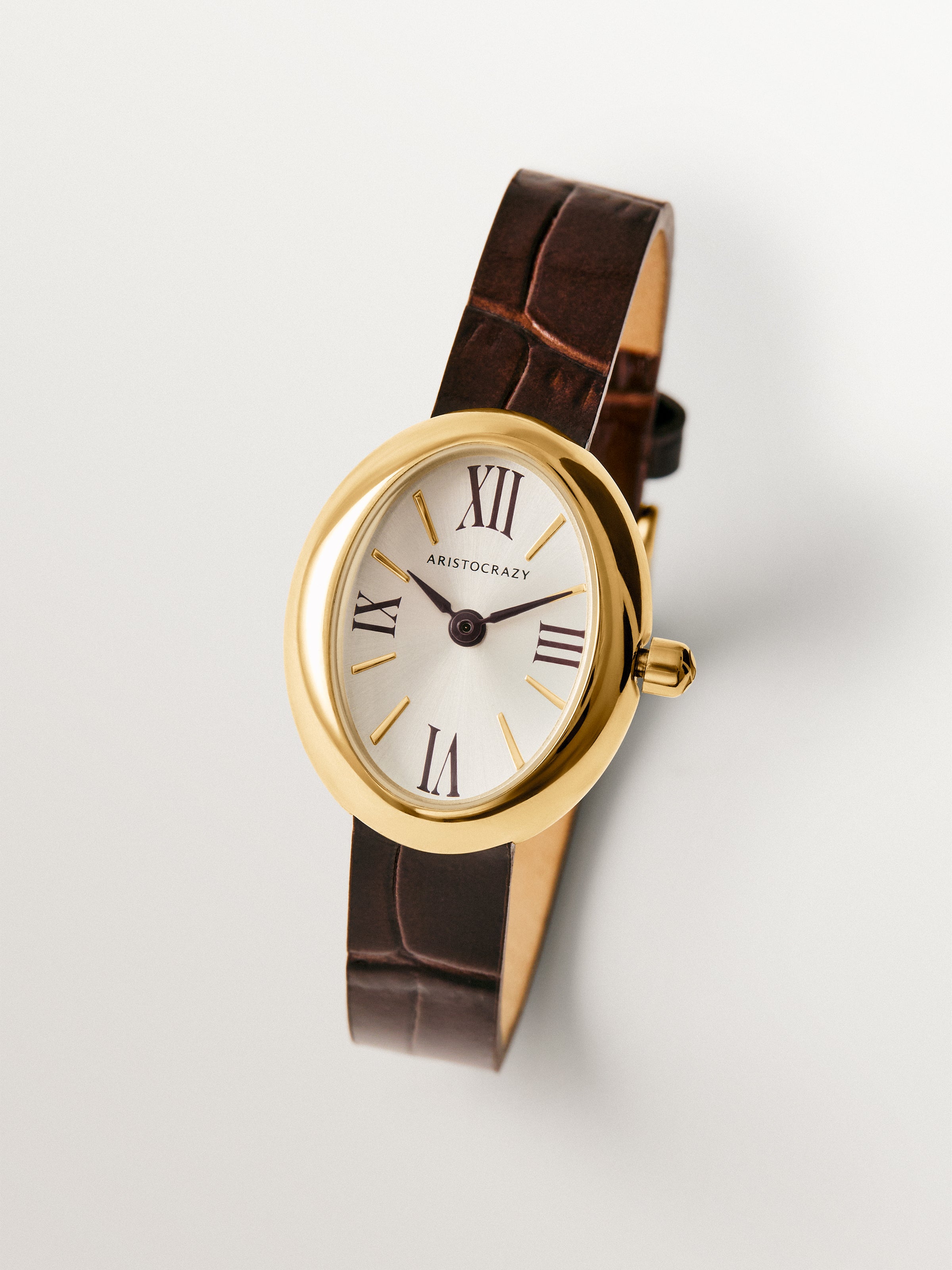 Reloj Salesas de acero con esfera blanca y correa de cuero marrón