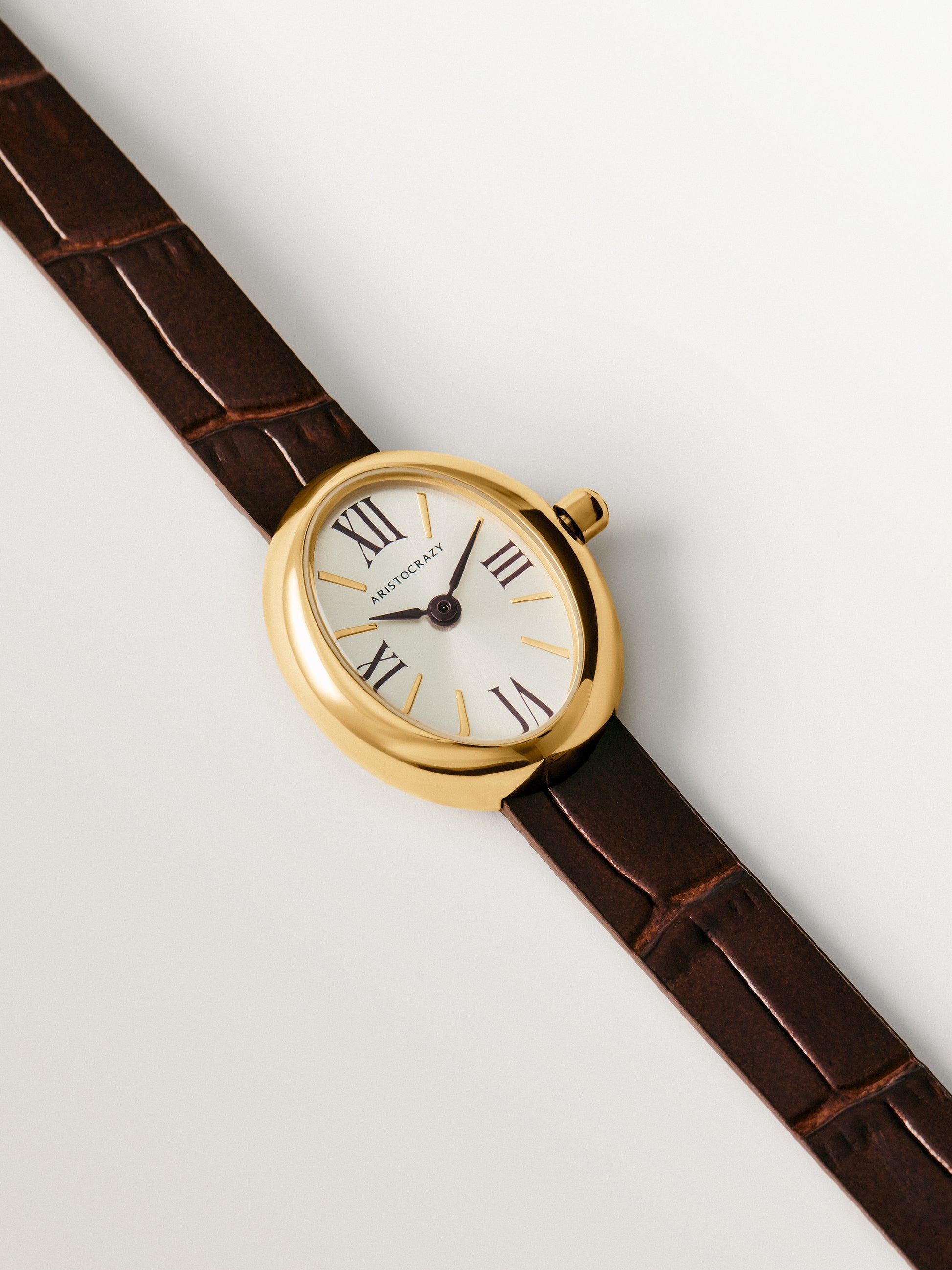 Reloj Salesas de acero con esfera blanca y correa de cuero marrón