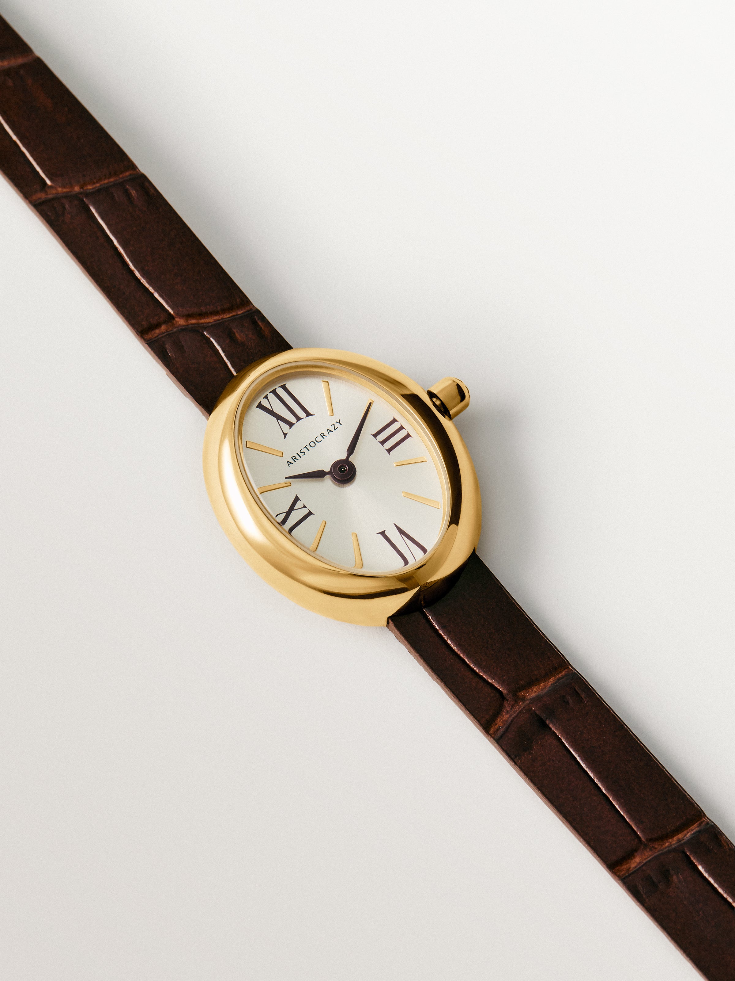 Reloj Salesas de acero con esfera blanca y correa de cuero marrón