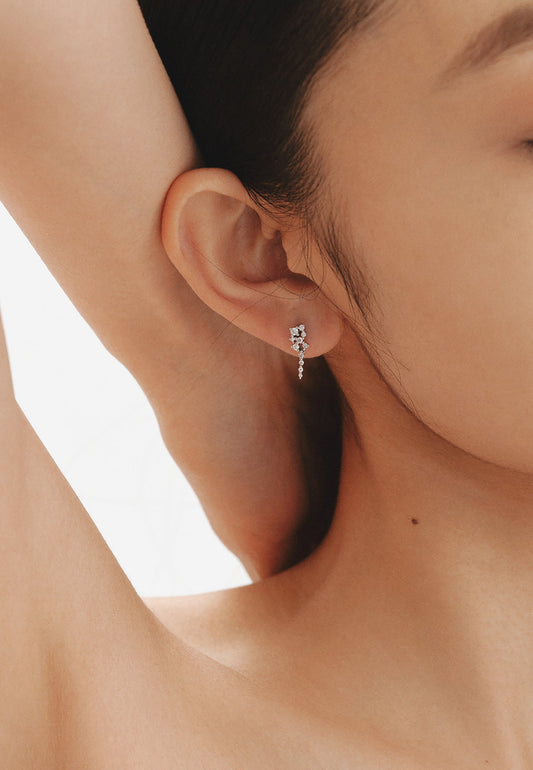 Pendientes de oro blanco de 9K con diamantes 0,3 cts